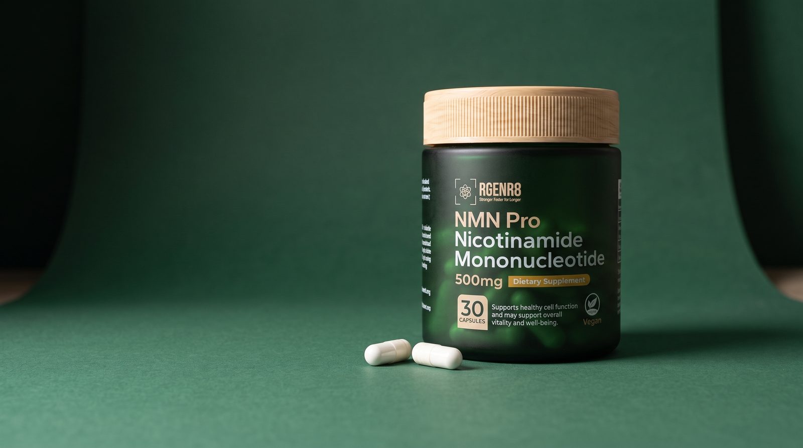 RGENR8 Pure NMN jar with two capsules on a deep green backdrop